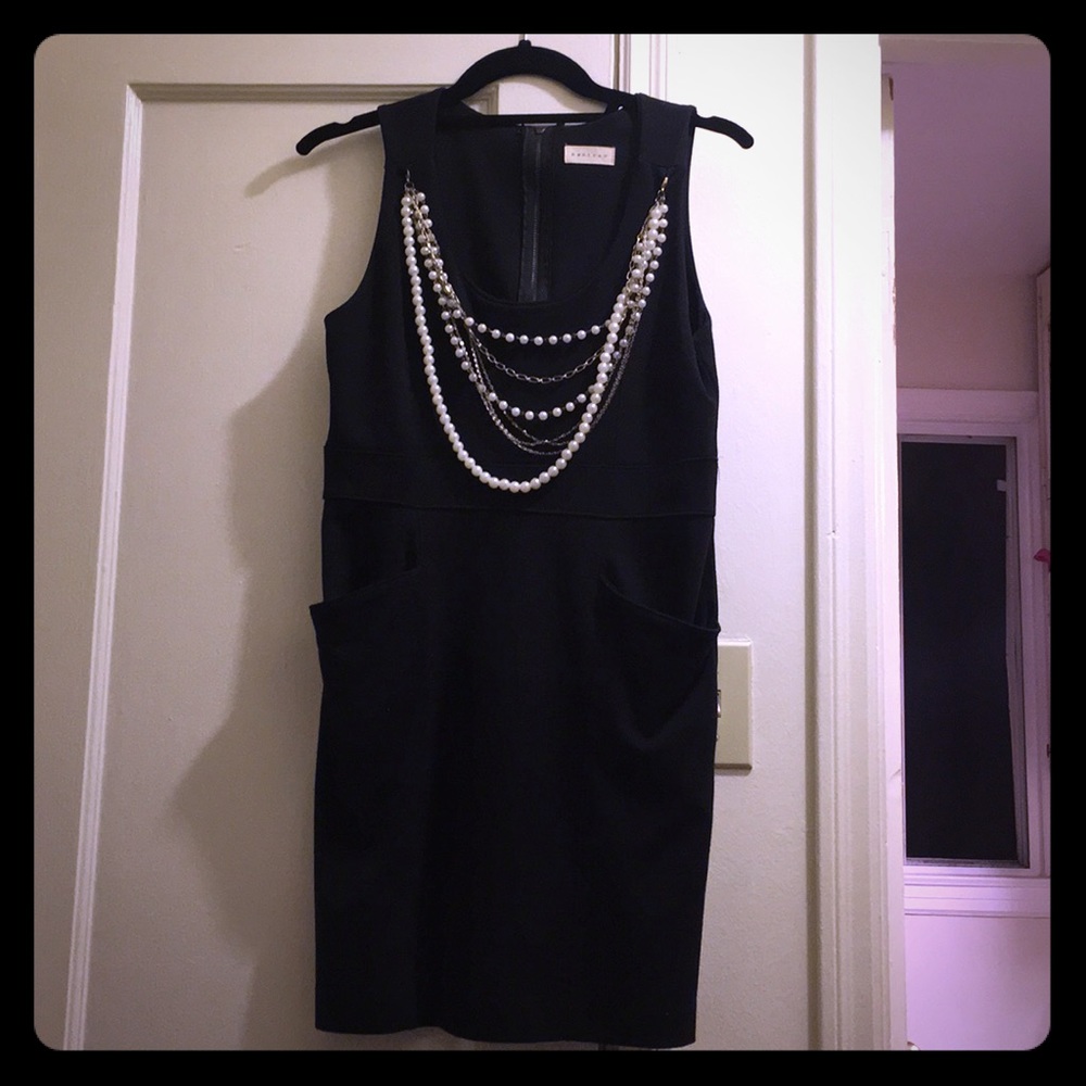 Black dress with attached pearl necklace